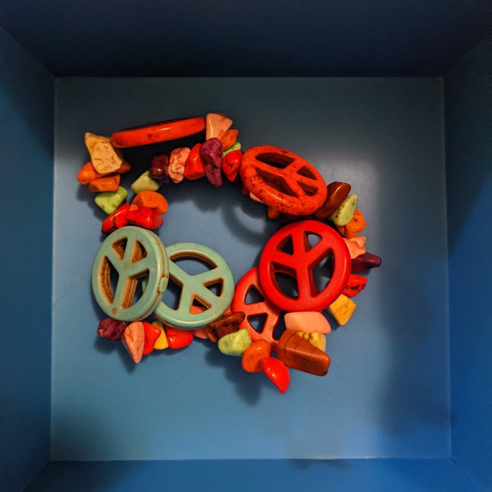 Red and blue peace sign rock elastic bracelet